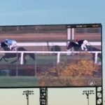 Titled, in the lead, at Churchill Downs